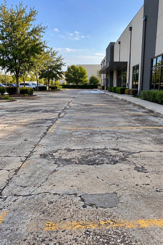 Parking Lot Replacement before, damaged concrete
