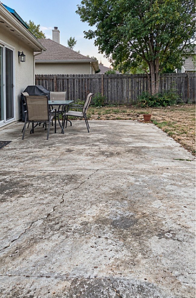Backyard Patio before, damaged concrete